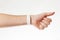 Hand with white wristband mockup. Empty ticket wrist band design