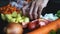 Hand woman cooking soup with fresh Chicken and vegetables