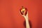 Hand of woman hold sweet bell pepper or paprika, heart