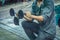 Hand of worker holding vacuum suction cup tool . selective focus