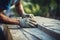 hand of worker plastering cement at the wall for building house