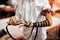 Hand wrap tefilin around the other hand. Jewish teenager 13 years old celebrates bar mitzvah
