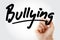 Hand writing Bullying with marker