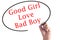 Hand writing Good Girls Love Bad Boys on transparent board