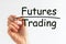 Hand writing inscription FUTURES TRADING with marker, concept, the letters in black, financial and trading concept