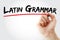 Hand writing Latin grammar with marker