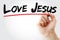 Hand writing Love Jesus with marker, concept background