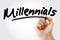 Hand writing Millennials text with marker