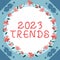 Hand writing sign 2023 Trends. Internet Concept things that is famous for short period of time in current year