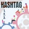 Hand writing sign Hashtag. Business concept a word or phrase preceded by a hash sign Type of metadata tag Four Teammates