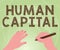 Hand writing sign Human Capital. Business overview Intangible Collective Resources Competence Capital Education