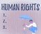 Hand writing sign Human Rights. Business overview Moral Principles Standards Norms of a showing protected by Law