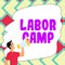 Hand writing sign Labor Camp. Business concept a penal colony where forced labor is performed