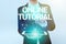 Hand writing sign Online Tutorial. Business overview process of tutoring in an online or virtual environment Woman In