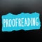 Hand writing sign Proofreading. Word Written on act of reading and marking spelling, grammar and syntax mistakes