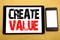 Hand writing text caption inspiration showing Create Value. Business concept for Creating Motivation Written on tablet laptop, woo