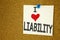Hand writing text caption inspiration showing I Love Liability concept meaning Accountability Legal Blame Risk Loving written on s