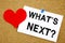 Hand writing text caption inspiration showing Question What`s Next concept meaning What is Next Self-Development Improvement Love