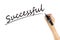 Hand writing word successful with black color marker pen isolated on white background. business target to success concept.