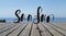 Hand written lettering composition.Phrase Sun Fun. Wooden pier a