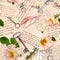 Hand written letters, wild roses, post stamps, watercolor feathers, keys on paper texture with text. Seamless pattern