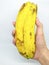 The hand and yellow banana