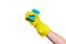 Hand in yellow glove compresses the sponge for washing