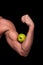 Hand of a young athlete holding an Apple with a bicep