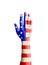 Hand of young man raised with United States of America flag patt