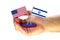 Hand of a young man on a white background with the flags of the USA and Israel