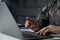 Hand of young soldier pointing to laptop screen