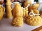 Handcrafted beeswax candle collection. Hand-poured garden gnome with braids craftsmanship candles