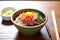 handcrafted ceramic bowl of bibimbap