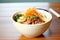 handcrafted ceramic bowl of bibimbap