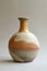 Handcrafted ceramic vase with natural tones and textures