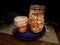 Handcrafted Kimchi in Sealable Glass Jars with Moody Lighting on a Purple Plate