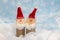 handcrafted santa gnomes made of wood and soft textile background