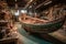 handcrafted wooden boat on display in workshop