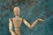 Handcrafted wooden man figure mannequin model dummy doll on background. Copy space