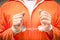 Handcuffed Hands - Guantanamo prison orange clothes