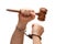 Handcuffed Man Holding Wooden Gavel on White