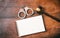 Handcuffs, gavel and notebook, copy space, on a wooden background.