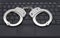 Handcuffs on laptop keyboard