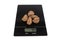 Handful of brazil nuts being weighed on a digital scale isolated over white