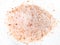 Handful of ground pink himalayan salt on plate