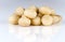 A handful of kernels of macadamia nuts