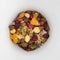 a handful of a mixture of natural fruits and grains, muesli