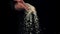 A handful of uncooked rice falls from a man\'s hand. Filmed is slow motion 1000 fps.