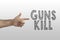 Handgun gesture with inscription on gradient background: Guns kill. GUN CONTROL sign concept