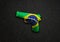 A handgun illustration with a Brazilian flag overlay to symbolize gun crime, suicide and murder with copy space